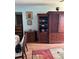 An elegant living space featuring wooden furniture and classic decor at 5940 21St N St # 11, St Petersburg, FL 33714