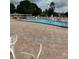 Community pool offers a refreshing oasis with ample seating and sunny lounging spots at 5940 21St N St # 11, St Petersburg, FL 33714