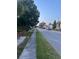Neighborhood street view with sidewalks and manicured lawns at 5940 21St N St # 11, St Petersburg, FL 33714