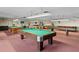 Billiards room with multiple pool tables, creating an inviting space for recreation at 6070 80Th N St # 308, St Petersburg, FL 33709