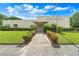 The well-manicured exterior of the community clubhouse at 6070 80Th N St # 308, St Petersburg, FL 33709