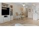 Inviting dining area featuring a stylish table, adjacent to living spaces at 6070 80Th N St # 308, St Petersburg, FL 33709