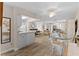 Bright and open floorplan with views from the kitchen into the spacious living and dining area at 6070 80Th N St # 308, St Petersburg, FL 33709