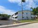 Spacious condo building with parking, awnings, and easy access at 6100 21St N St # 17, St Petersburg, FL 33714