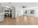 Modern kitchen with stainless appliances that opens to a spacious living area, great for gatherings at 6204 Nebraska Ave, New Port Richey, FL 34653
