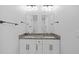 Bright bathroom with double vanity at 7603 Rhode Island Dr, Tampa, FL 33619