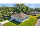 Charming single-story home featuring a well-maintained lawn, attached garage and simple landscaping at 7603 Rhode Island Dr, Tampa, FL 33619