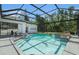 Beautiful private pool with a screen enclosure and an in-ground spa at 8406 Glengarry Pl, Trinity, FL 34655