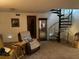 Living room with spiral staircase and comfy seating area at 9481 Patrick St, Brooksville, FL 34601