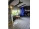 Living room with tile floor, Christmas tree, and view of the yard at 9481 Patrick St, Brooksville, FL 34601