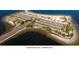 A high angle view depicts a parking area on the beach adjacent to the water at 1069 Captains Way, Tarpon Springs, FL 34689