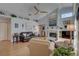 Inviting living room with fireplace, high ceilings and hardwood floors at 1069 Captains Way, Tarpon Springs, FL 34689