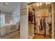 Bedroom featuring walk-in closet and neutral wall color at 1069 Captains Way, Tarpon Springs, FL 34689
