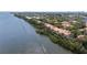 Scenic waterfront community featuring townhouses with lush landscaping and picturesque water views at 1117 Shipwatch Cir, Tampa, FL 33602