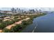 Stunning aerial view showcases waterfront property with a cityscape backdrop at 1117 Shipwatch Cir, Tampa, FL 33602