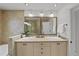 Well-appointed bathroom with dual sinks, stylish mirrors, and ample storage space at 1117 Shipwatch Cir, Tampa, FL 33602