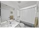 Clean, white bathroom with shower and tub combination featuring modern fixtures at 1117 Shipwatch Cir, Tampa, FL 33602