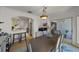 Open-concept dining room next to the kitchen and living room, with stylish furnishings and natural light at 1117 Shipwatch Cir, Tampa, FL 33602