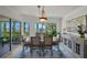 Dining room features water views, modern lighting, and stylish furniture at 1117 Shipwatch Cir, Tampa, FL 33602