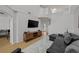 Bright and airy living room with tall ceilings, staircase, and natural light at 1117 Shipwatch Cir, Tampa, FL 33602