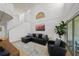Spacious living room features natural light, tall ceilings, and access to the patio at 1117 Shipwatch Cir, Tampa, FL 33602