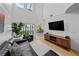 Spacious living room with a water view, high ceilings, and stylish furnishings at 1117 Shipwatch Cir, Tampa, FL 33602