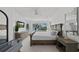Bedroom with a neutral color scheme, features stunning water views, and is bathed in natural light at 1117 Shipwatch Cir, Tampa, FL 33602