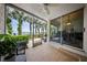 Screened patio with views of the water, perfect for outdoor dining and relaxation at 1117 Shipwatch Cir, Tampa, FL 33602