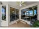 Screened patio with views of the water, perfect for outdoor dining and relaxation at 1117 Shipwatch Cir, Tampa, FL 33602