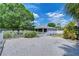 Fenced backyard with a home and well-maintained landscape at 11427 Laurel Brook Ct, Riverview, FL 33569