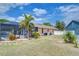 Large backyard with a screened-in pool, offering privacy and space for relaxation and outdoor activities at 11427 Laurel Brook Ct, Riverview, FL 33569