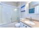 Bathroom featuring a tub with shower and a single sink vanity at 11427 Laurel Brook Ct, Riverview, FL 33569