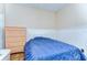 Bedroom featuring a double bed and wood floor at 11427 Laurel Brook Ct, Riverview, FL 33569