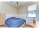 Bedroom featuring a double bed and wood floor at 11427 Laurel Brook Ct, Riverview, FL 33569
