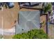 Overhead aerial view of the house roof, showcasing its structure and integration with the surrounding landscape and yard at 11546 Leisure W Ln, Largo, FL 33773