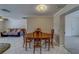 This spacious dining room features tile floors and is ready for cozy gatherings and memorable meals at 11546 Leisure W Ln, Largo, FL 33773