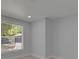 Bedroom with luxury vinyl flooring, window and recessed lighting at 1208 E 18Th Ave, Tampa, FL 33605