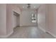 Light pink bedroom with new floors, a closet, and a view from the window at 1208 E 18Th Ave, Tampa, FL 33605