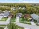 Aerial view of a home, highlighting its position within a well-treed and green residential neighborhood at 12531 Blazing Star Dr, Tampa, FL 33626