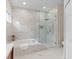 Bathroom features a luxurious walk-in shower and soaking tub at 12531 Blazing Star Dr, Tampa, FL 33626