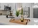 Modern kitchen featuring white cabinets, stainless steel appliances, and stylish countertop at 12531 Blazing Star Dr, Tampa, FL 33626