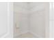 Empty walk-in closet offers ample storage space for an organized wardrobe at 12531 Blazing Star Dr, Tampa, FL 33626