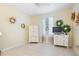 Comfortable bedroom with bright decor, a closet, and neutral-colored walls at 13135 Plantation Ter, Seminole, FL 33776