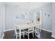 Inviting dining room with chandelier lighting and lovely dark wood floors at 13135 Plantation Ter, Seminole, FL 33776