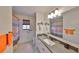 Bathroom featuring a granite counter and an colorful shower curtain at 13208 Sydney Rd, Dover, FL 33527