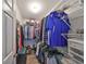 Walk-in closet with wire shelving and organized clothing storage at 13208 Sydney Rd, Dover, FL 33527