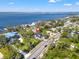 An aerial view of the property and the coastal neighborhood shows proximity to the ocean and surrounding neighborhood at 1542 Bayshore Blvd, Dunedin, FL 34698