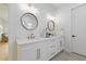 Bathroom with double sink vanity and bright natural lighting at 1542 Bayshore Blvd, Dunedin, FL 34698