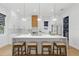 Beautiful, bright kitchen with a large island, modern fixtures and stainless steel appliances at 1542 Bayshore Blvd, Dunedin, FL 34698