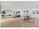 Open-concept living space featuring a dining area, living room, and modern decor at 1542 Bayshore Blvd, Dunedin, FL 34698
